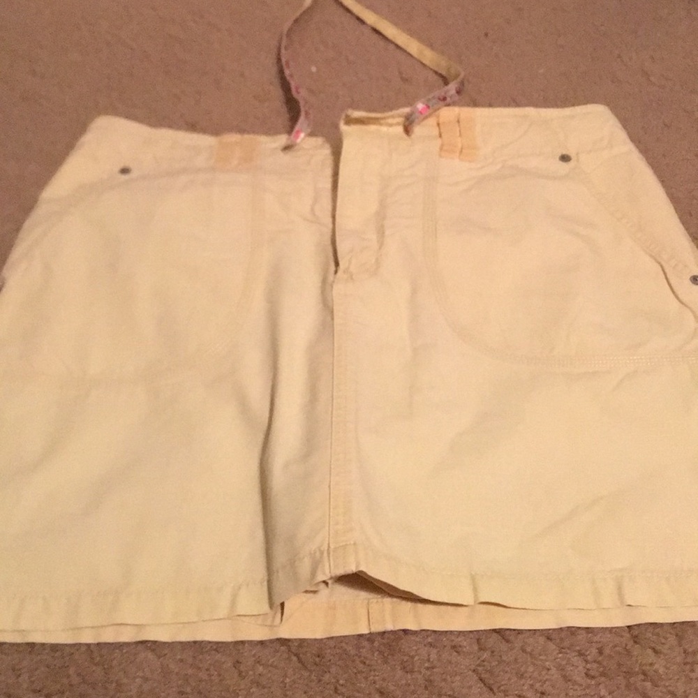 Pale yellow skort 12 buttons and ties